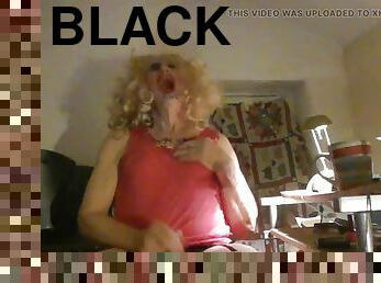 Sissy crossdresser cumdump inserts big black dildo in her lady hole, jerks off, smokes