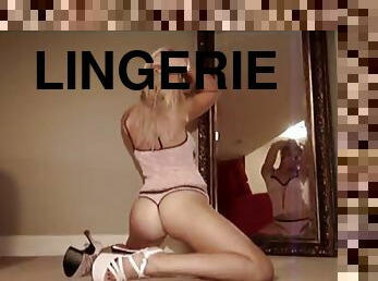 Pink lingerie goes well with sexy high heels on a teen model