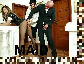 Slutty maid in a latex uniform gets fucked by a married couple
