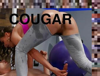 Wavy-haired cougar Cherie Deville fucks young boy in the gym
