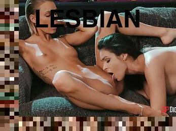 Hot lesbian babes lick pussies when watching TV on a couch