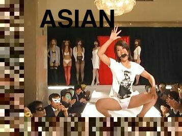 Asian models posing on catwalk