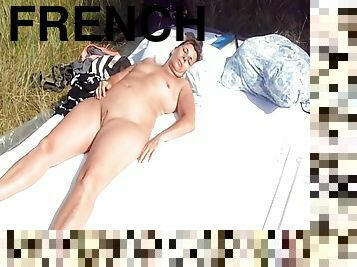An unchaste french woman sleeps totally naked in the sun