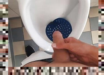 Young Student is pissing in his public school toilet