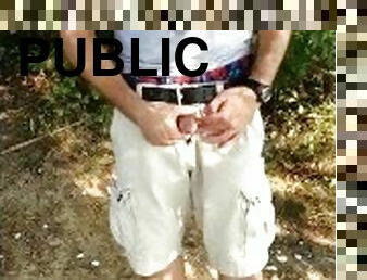 Public masturbation in the woods - jerking off by the water and cumming.