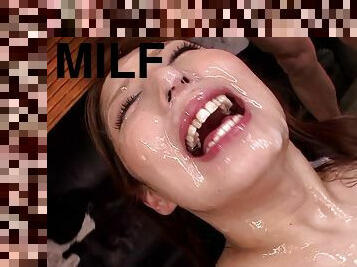 Ravishing milf gets a facial cum shot after giving hand jobs at a sticky bukkake party