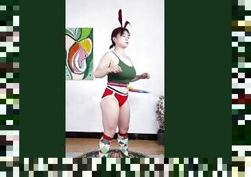 Sports girls, exercise together in Christmas costumes, hula hoop exercises