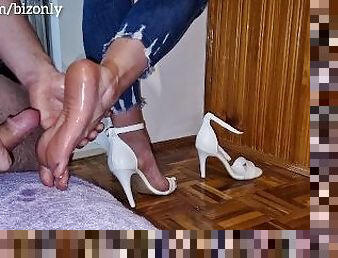 he takes off my heels, rubs his cock against my soles and cums on them!