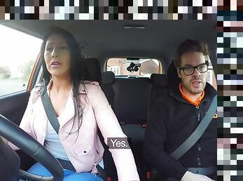 Driving instructor lets a brunette ride his meaty gear lever