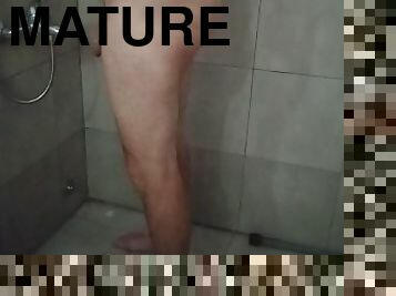 Mature man take a sexy shower and his masturbate.