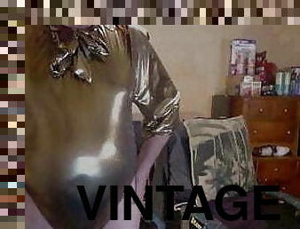 Tranny model in vintage gold lame&#039; bodysuit.