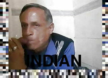 Indian older daddy sucking cock at gloryhole