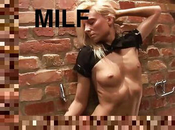 Milf in a policewoman outfit with small breasts