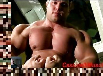 giant bodybuilder lift & carry another person , 400 lb of huge muscles