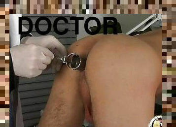 The doctor does a deep anal probe of the twink during his physical exam