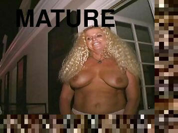 Big Tit Mature Blonde Gives Us A Show At Mardi Gras