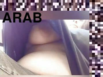 BBW Arab girl teases camera with her nipples getting hard while people are outside shopping