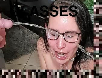 Piss slut loves it when I soak her face and glasses with my piss