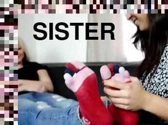 Two sisters foot love and play (lesbian feet, foot teasing, socks, worn socks, bare feet, soles)
