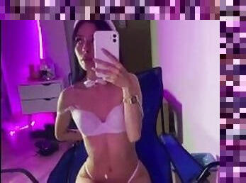 cosplay teen with bunny ears spread legs in front of the mirror in lingerie