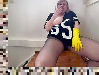 Mature cleaning lady with big tits fingers her pussy through dirty pantyhose wearing yellow rubber gloves