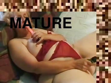 Fat Mature plays with vagina Masturbation