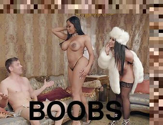 A pair of large light skinned boobs, a big round ass and two cunts for 1 guy
