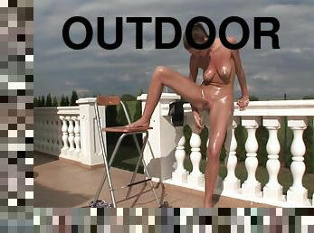 Outdoor oily solo action with extra-hot skinny teen