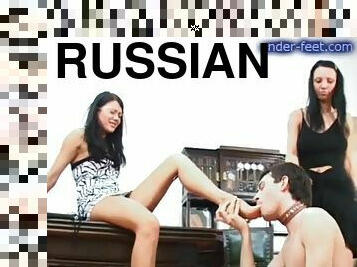 Russian brunette giving huge dick blowjob in femdom shoot