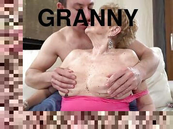 Granny with huge naturals is giving a nice cock suction