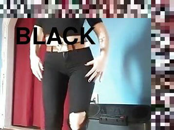 Girl in tight black jeans
