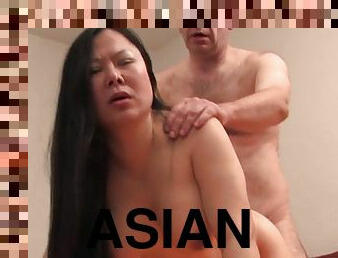 Asian bride enjoys having sex in the bedroom