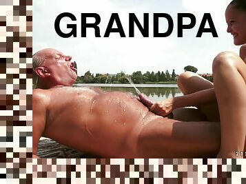 Bikini slut pisses in the mouth of a horny grandpa and fucks him