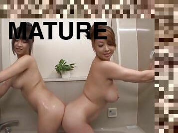 Two cute Mature Asian babes having lesbian fun in the bath