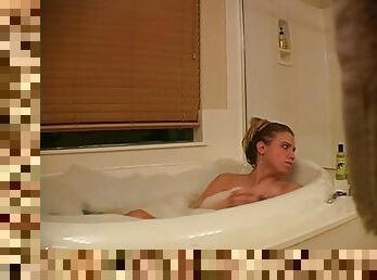 Hiden cam footage for a sexy teen babe relaxing in a bath