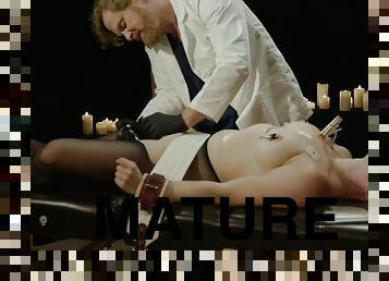 Mature endures doctor's kinky sexual play in a dirty BDSM