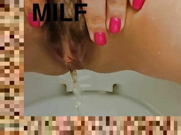 Sexy MILF pisses in her toilet slave&#039;s mouth. Golden Rain.