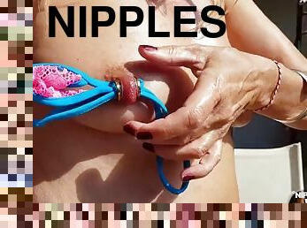 Nippleringlover pulls rope through huge pierced nipples with extremely stretched nipple piercings