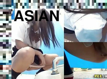 Hidden cam catching Asian teens pissing in the school toilet