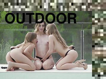 Naked teens share their lust for pussy oral sex in a flaming outdoor play