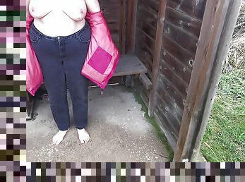Barefoot, naked tits slapping at public bus stop