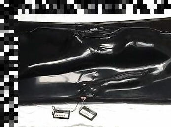 Boy in trouble. Plays with electro chastity in vacbed. Vaccleaner starts. No escape, then cums