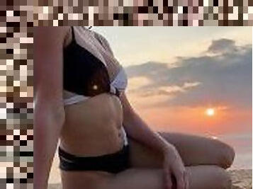 I love to relax on the sand on a beach and enjoy beautiful sunset while teasing you with my hot body