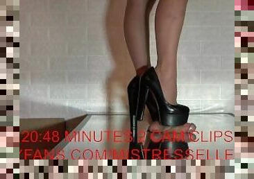 Mistress Elle squeezes out her slave's cum with her wide high heels