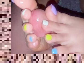 Rainbow nails footjob on big dick