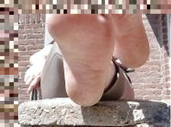 Bare feet wrinkled soles and that all in the beautifull sun.????
